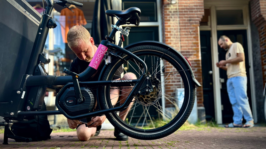 Yeply mechanic working on a Dockr cargo bike
